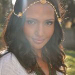 Helena wearing our mother's Eritrean gold head jewelry and Zuria (dress.)