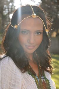 Helena wearing our mother's Eritrean gold head jewelry and Zuria (dress.)